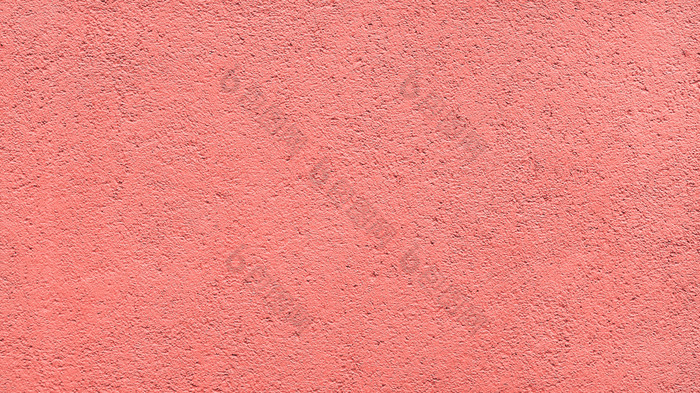 珊瑚粉红色的水泥混凝土墙背景深焦点模拟模板水泥混凝土墙背景