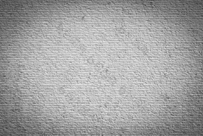 灰色的水泥混凝土墙背景深焦点模拟模板与黑暗的边缘关闭灰色的水泥混凝土墙背景深焦点模拟模板