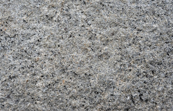 花岗岩背景关闭明亮的硬灰色花岗岩岩石纹理为模板模拟自然石头灰色花岗岩背景