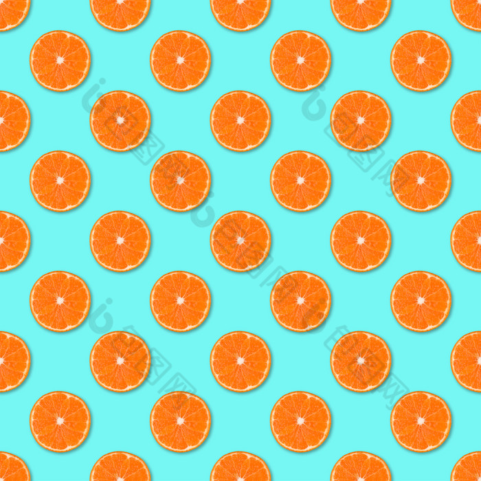 新鲜的橙色橘子片无缝的模式关闭柑橘类水果蓝色的背景工作室摄影新鲜的橙色橘子片无缝的模式关闭柑橘类水果背景工作室摄影