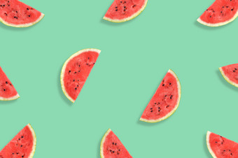 平躺西瓜一半片薄荷背景西瓜模式夏天水果有创意的最<strong>小</strong>的夏天流行艺术概念平躺西瓜一半片薄荷背景西瓜模式