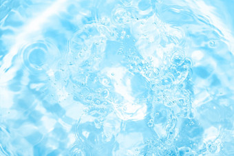 池热浴缸极可意水流按摩浴缸水<strong>背景</strong>涟漪明亮的蓝色的透明的水<strong>游泳</strong>池与光反射前视图池热浴缸极可意水流按摩浴缸水<strong>背景</strong>涟漪明亮的蓝色的透明的水<strong>游泳</strong>池与光反射前视图