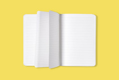 空白开放办公室记事本笔记本与翻转页面孤立的黄色的背景模拟前视图空白开放办公室记事本笔记本与翻转页面孤立的黄色的背景模拟前视图