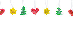 加兰与Diy圣诞节树明星和心使从红色的黄色的和绿色橡皮泥圣诞节新一年横幅与复制空间橡皮泥工艺概念加兰与Diy圣诞节树明星和心使从红色的黄色的和绿色橡皮泥圣诞节新一年横幅与复制空间橡皮泥工艺概念
