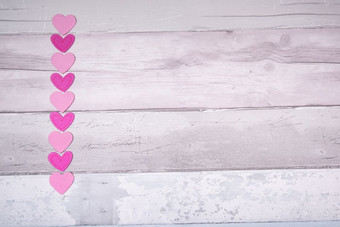 粉红色的感觉心背景老木木板类似老木条镶花之地板地板上概念情人节一天和爱一般粉红色的感觉心背景老木木板类似老木条镶花之地板地板上概念情人节一天和爱一般