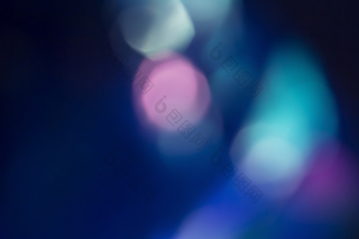 色彩斑斓的软圆形散景覆盖为使用增强图片与复制空间深《暮光之城》蓝色的背景色彩斑斓的软圆形散景覆盖