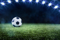 足球足球背景与行聚光灯照明球的绿色的地盘体育场体育冠军世界杯事件全景横幅