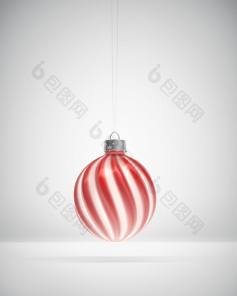 挂光滑的红色的和白色扭曲的条纹圣诞节小玩意白色阴影背景圣诞节装饰节日大气概念
