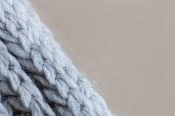 针织羊毛变形表面米色背景<strong>宏</strong>软灰色美利奴羊毛模式背景特写镜头秋天和冬天<strong>平躺</strong>斯堪的那维亚最小的风格水平