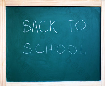 黑色的学校黑板背景与的登记回来的学校黑色的学校黑板背景