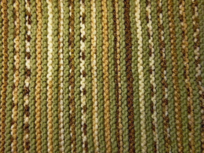 针织织物纹理背景图像爱好休闲工艺品垂直安排的模式绿色和棕色（的）针织织物纹理背景图像爱好休闲工艺品绿色和棕色（的）
