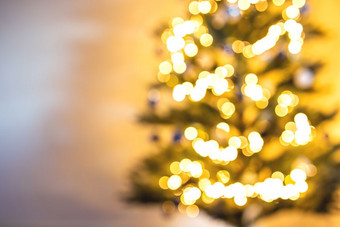 圣诞节树模糊和散焦光背景装饰与圣诞节装饰散景色彩斑斓的闪亮的灯美圣诞节树模糊和散焦光背景装饰与圣诞节装饰散景色彩斑斓的闪亮的灯