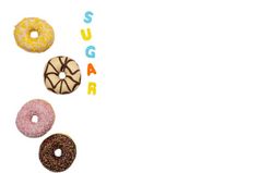 各种各样的彩色的美味的甜甜圈白色背景与的词糖空间为文本快餐甜蜜的概念各种各样的彩色的美味的甜甜圈白色背景与的词糖空间为文本