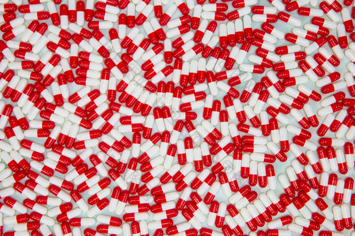 医疗背景与红色的和白色胶囊为维生素药物药物治疗药片制药主题现代设计业务医疗背景与红色的和白色胶囊为维生素药物药物治疗药片制药主题现代设计