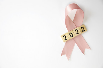 粉红色的丝带与<strong>文本</strong>孤立的白色背景癌症意识女士健康新一年概念与复制空间空间为<strong>文本</strong>粉红色的丝带与<strong>文本</strong>孤立的白色背景癌症意识女士健康新一年概念与复制空间