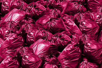 背景垃圾转储本垃圾垃圾垃圾塑料袋桩垃圾袋粉红色的紫色的
