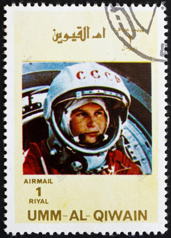 嗯AL-QUWAIN约邮票印刷的嗯al-Quwain显示尤里加加宇航员的第一个人类成外空间约