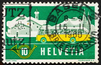 瑞士约邮票印刷的瑞士显示高山帖子公共汽车冬天背景约