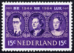 荷兰约邮票印刷的荷兰显示王博杜安女王朱莉 安娜而且大公爵夫人夏洛特三国约