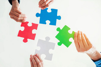 团队合作会议业务拼图谜题解决方案在一起概念