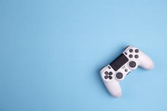 操纵杆游戏控制器孤立的蓝色的背景视频游戏控制台发达<strong>互动娱乐</strong>