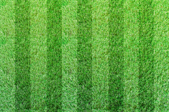 前视图条纹草足球场绿色草坪上模式背景
