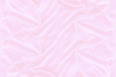 光滑的优雅的粉红色的丝绸纹理可以使用为背景