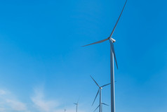 风涡轮农场蓝色的天空背景风权力可再生能源概念