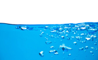 空气泡沫不断上升的表面蓝色的纯水摘要背景