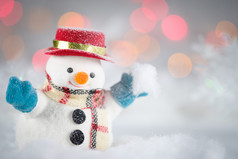 雪人玩雪和装饰散景背景与复制空间为季节问候快乐圣诞节快乐新一年点选择