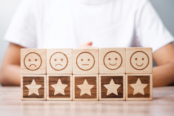 情感脸和明星象征块表格背景服务评级排名客户审查满意度评价和反馈概念