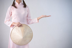 美丽的女人粉红色的越南传统的衣服衣服文化越南