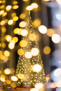 色彩斑斓的光摘要圆形散景圣诞节和快乐新一年背景
