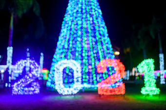 快乐新一年概念色彩斑斓的光圆形散景文本摘要圆形散景圣诞节树背景装饰在圣诞节和新一<strong>年节</strong>日照明