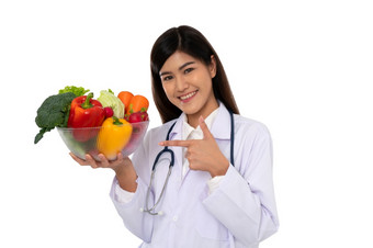 医生营养学家持有新鲜的水果<strong>橙色红色</strong>的和绿色苹果和微笑诊所健康的饮食概念营养食物处方为好健康水果医学