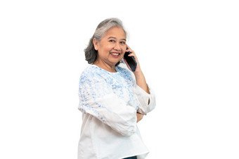 快乐亚洲高级女人持有智能手机和<strong>使用</strong>在线应用程序<strong>移动电话</strong>和发短信短信消息聊天孤立的背景概念容易<strong>使用</strong>和应用程序为上了年纪的人