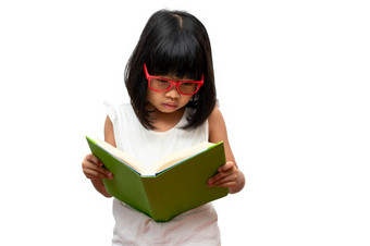 快乐亚洲小学前教育女孩穿红色的眼镜持有和读绿色书白色孤立的背景概念学校孩子和教育小学和学前教育首页学校