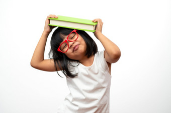 有趣的和快乐亚洲小学前教育女孩穿红色的眼镜持有绿色书的头白色孤立的背景概念学校孩子和教育小学和学前教育首页学校