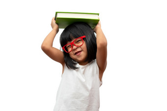 有趣的和快乐亚洲小学前教育女孩穿红色的眼镜持有绿色书的头白色孤立的背景概念学校孩子和教育小学和学前教育首页学校