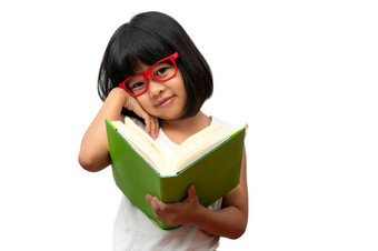 快乐亚洲小<strong>学前</strong>教育女孩穿红色的眼镜持有和读绿色书白色孤立的<strong>背景</strong>概念学校孩子和教育小学和<strong>学前</strong>教育首页学校