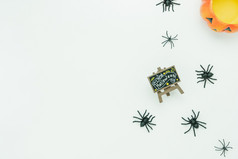 表格前视图空中图像装饰快乐万圣节一天背景conceptflat躺配件至关重要的对象标志的南瓜内容和蜘蛛白色木制空间为设计文本
