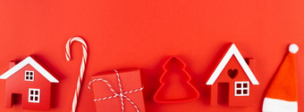 圣诞节作文新一年圣诞节平躺前视图圣诞节假期庆祝活动装饰红色的纸背景与Copyspace模板模型问候卡文本设计