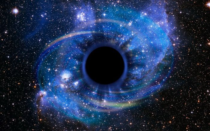 星星是崩溃深黑色的洞吸引了的巨大的引力场的黑色的洞看起来就像眼睛虹膜的天空元素这图像有家具的已开启