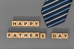 快乐父亲一天块与领带灰色的背景庆祝活动事件背景复制空间