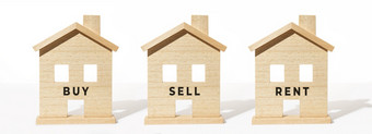 真正的房地产横幅集团木房子模型白色背景买出售租金概念