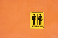 厕所。。。标志的橙色墙