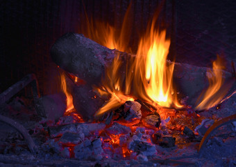 火火焰火焰壁炉燃烧燃烧热柴火日志篝<strong>火热</strong>木光温暖的冬天黑色的晚上