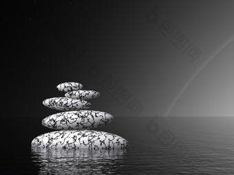 平衡黑色的和白色石头独自一人的海洋晚上与小彩虹黑色的和白色石头晚上