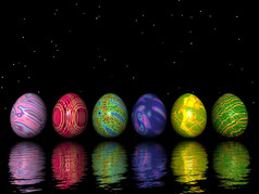 六个色彩斑斓的鸡蛋为复活节与他们的阴影黑色的背景复活节色彩斑斓的鸡蛋