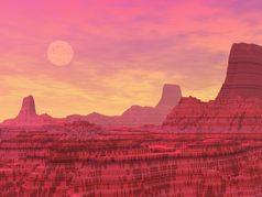 红色的景观与岩石山就像峡谷和行星日落
